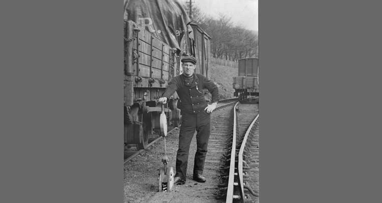 W. Minton poses with point lever (probably at Newtongrange)