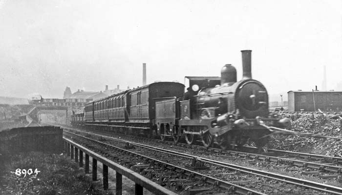 NBR No 404 2-4-0 ex Forth & Clyde Junction Railway on the Cowlairs incline with a Lennoxtown train